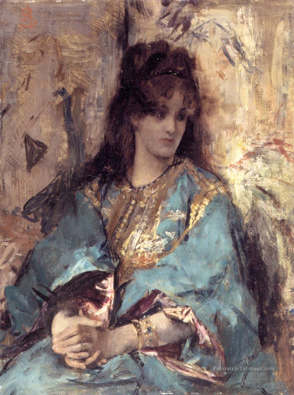 Une femme assise en robe orientale dame Peintre belge Alfred Stevens Peintures à l'huile